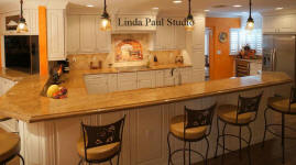 designer kitchen with mural backsplash