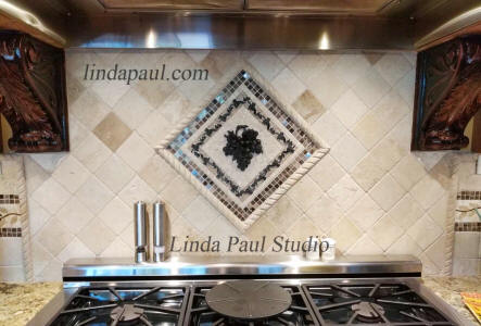 grape and vine mosaic tile backsplash